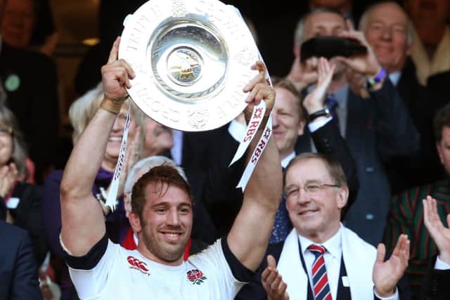 Captain Chris Robshaw lifts the Triple Crown trophy after victory over Wales. Picture: David Rogers/Getty Images
