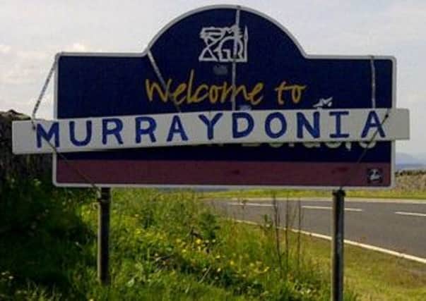 Andy Murray's gets his own sign at the Scotland/England border after winning Wimbledon. Picture:SWNS