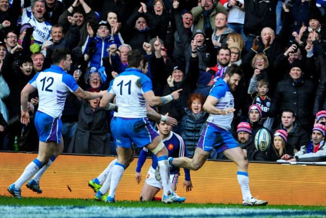 Tommy Seymour celebrates scoring Scotland's second try. Picture: Ian Rutherford