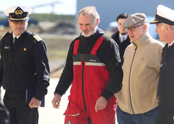 Andrew Halcrow (C) arrives in Punta Arenas, Chile. Picture: Getty