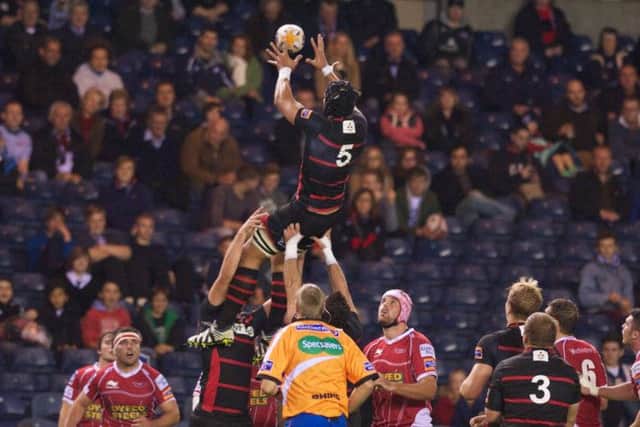 Izak van der Westhuizen takes a lineout during Edinburgh's game with Scarlets last September. Picture: Joey Kelly