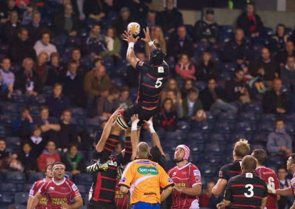 Izak van der Westhuizen takes a lineout during Edinburgh's game with Scarlets last September. Picture: Joey Kelly