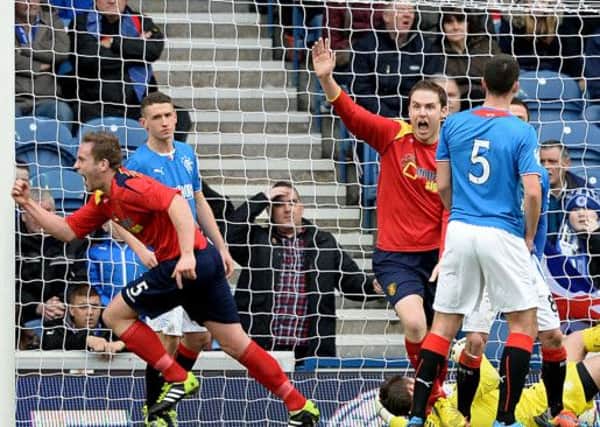 Albion Rovers' Ciaran Donnelly (left) charges off to celebrate his surprise opener Picture: SNS