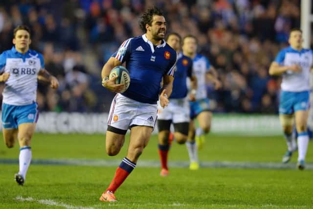 Yoann Huget breaks away to score France's first try. Picture: Getty