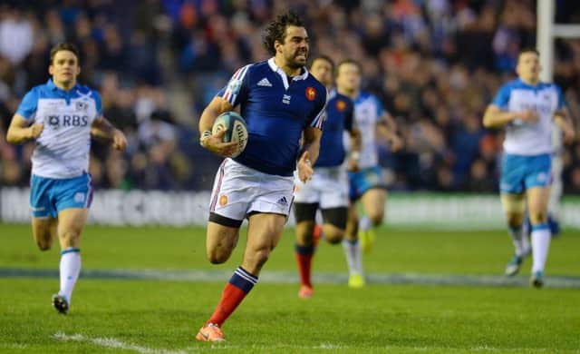 Yoann Huget breaks away to score France's first try. Picture: Getty