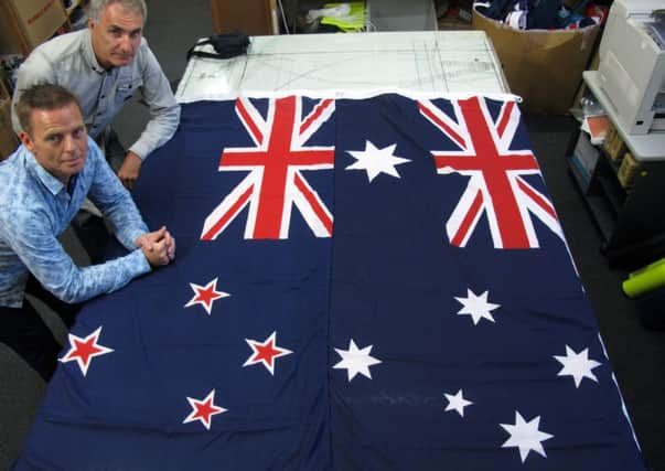 The New Zealand flag (left) is too similar to Australia's flag for some, as well as a relic from a colonial past. Picture: AP