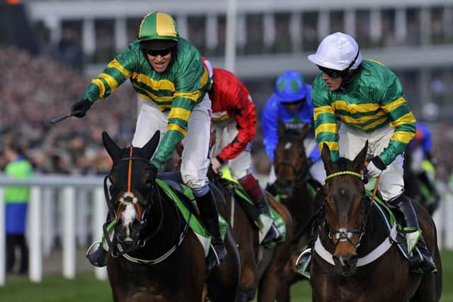 Barry Geraghty on Jezki beats My Tent Or Yours by a neck in the Champion Hurdle Challenge Trophy at the Cheltenham Festival to seal a famous one-two for owner JP McManus. Picture: Reuters