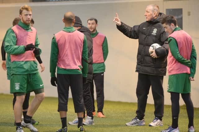 Terry Butcher will take his Hibs side to the Highlands tomorrow night. Picture: Phil Wilkinson