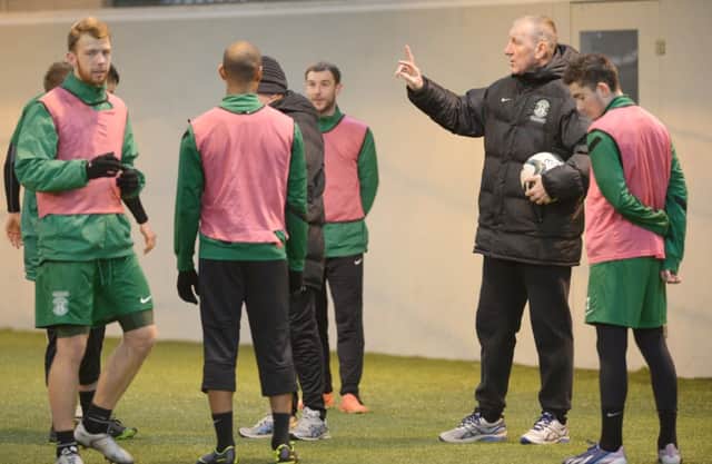 Terry Butcher will take his Hibs side to the Highlands tomorrow night. Picture: Phil Wilkinson