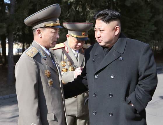 North Korean leader Kim Jong-Un (right). Picture: Getty