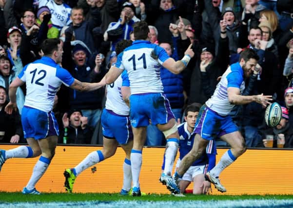 The Scottish backs celebrate Tommy Seymour's try against France. Picture: Ian Rutherford