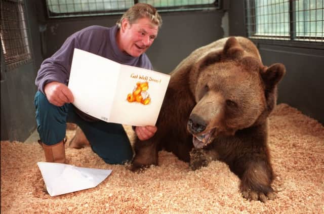Hercules the bear with owner and wrestling pal Andy Robin. Picture: Paul Raeburn
