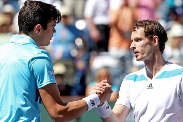 Milos Roanic is congratulated by Andy Murray  after their match during the BNP Parabas Open at the Indian Wells Tennis Garden. Picture: Getty