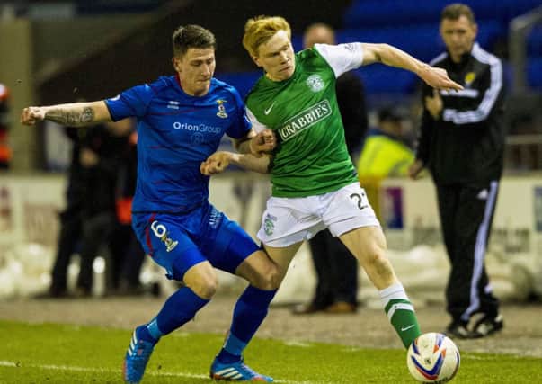 Inverness' Josh Meekings (left) battles with Duncan Watmore. Picture: SNS