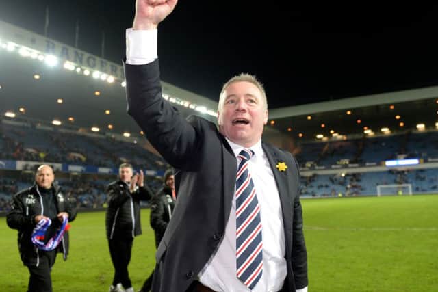 Rangers manager Ally McCoist celebrates after his team are crowned Scottish League One champions. Picture: SNS