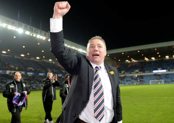 Rangers manager Ally McCoist celebrates after his team are crowned Scottish League One champions. Picture: SNS
