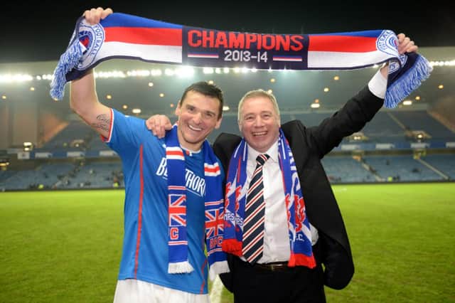 Ally McCoist (right) celebrates with captain Lee McCulloch. Picture: SNS