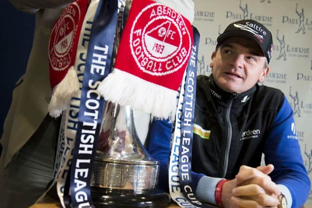 Aberdeen fan Paul Lawrie chose to miss a big tournament in order to cheer them on. Picture: SNS