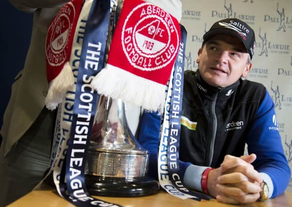 Aberdeen fan Paul Lawrie chose to miss a big tournament in order to cheer them on. Picture: SNS