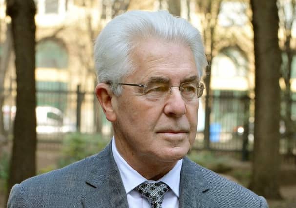 Max Clifford laughed in court when he heard the evidence against himself yesterday. Picture: PA
