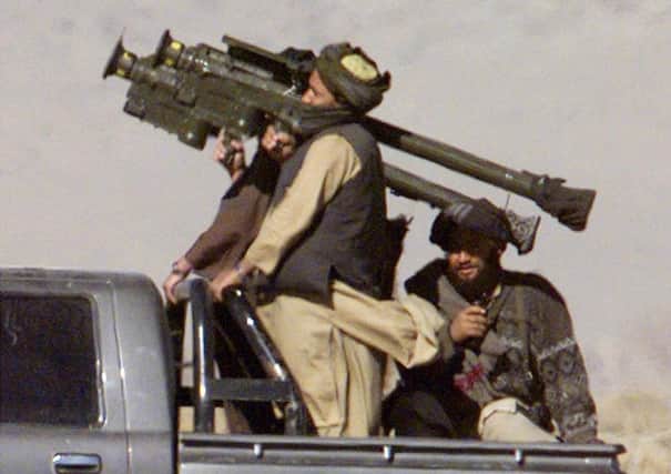 Taliban militiamen hold U.S.-made Stinger surface-to-air missiles. Picture: Reuters