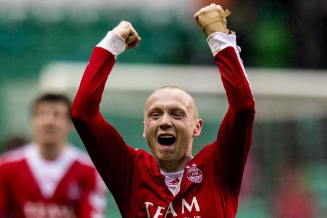 Willo Flood celebrates Aberdeens Scottish Cup win at Celtic. Picture: SNS