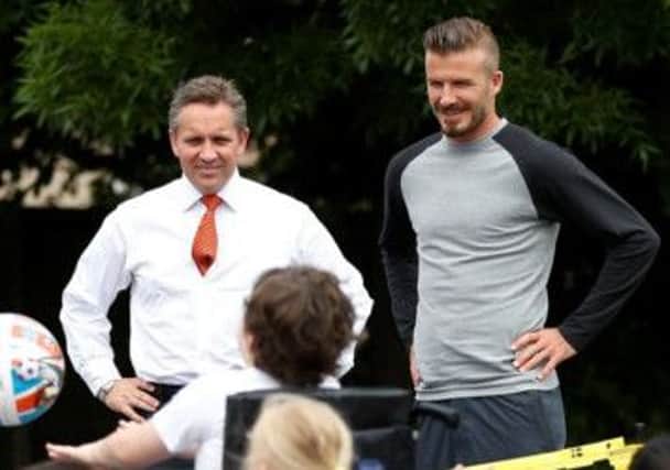 David Beckham with Sainsbury's boss Justin King. Picture: Contributed