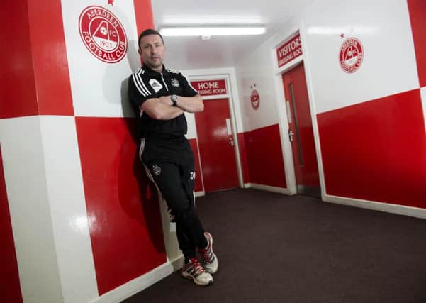Derek McInnes is hoping to see his side lift the trophy this afternoon. Picture: SNS