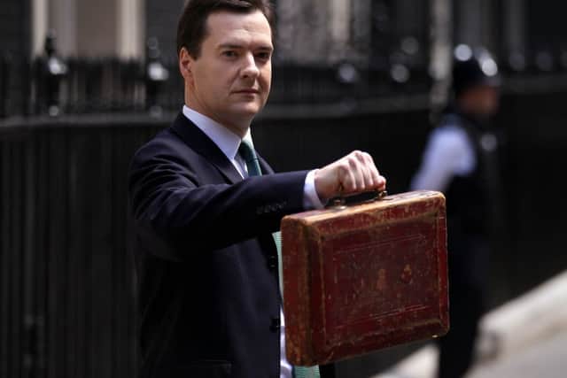 Chancellor of the Exchequer George Osborne holds Disraeli's budget box. Picture: Getty