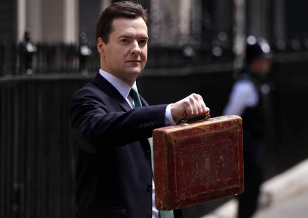 Chancellor of the Exchequer George Osborne holds Disraeli's budget box. Picture: Getty