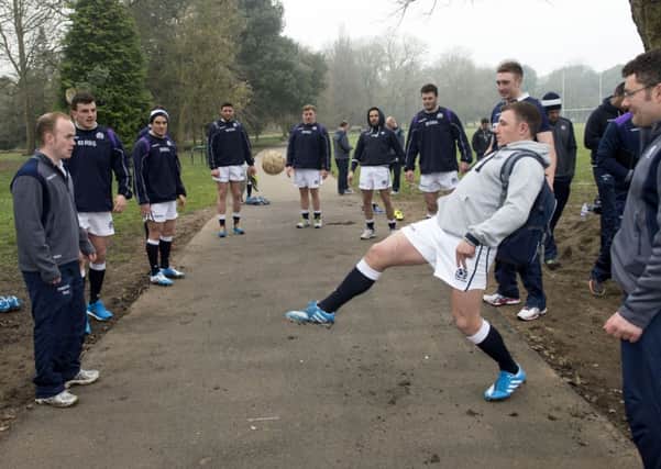 Duncan Weir gets involved as the Scotland squad indulge in a spot of keepie-uppie.  Picture: SNS