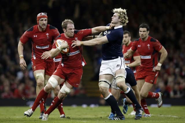 Wales' Lock Alun Wyn Jones hands off Scotland lock Richie Gray. Picture: Getty