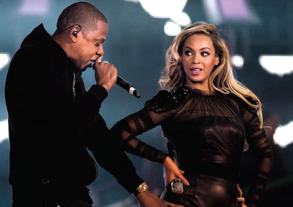 Beyonce on stage alongside rapper Jay-Z. Picture: Getty