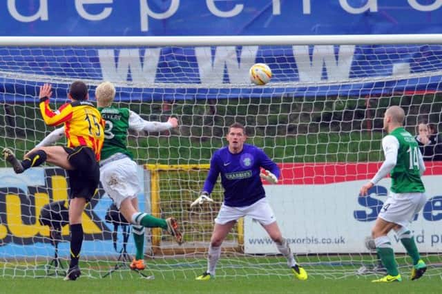 Lee Mair scores the second for Thistle.  Picture: Robert Perry