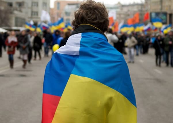 A protester in Moscow expressing anger at Russia's actions in Crimea, Ukraine. Picture: Getty