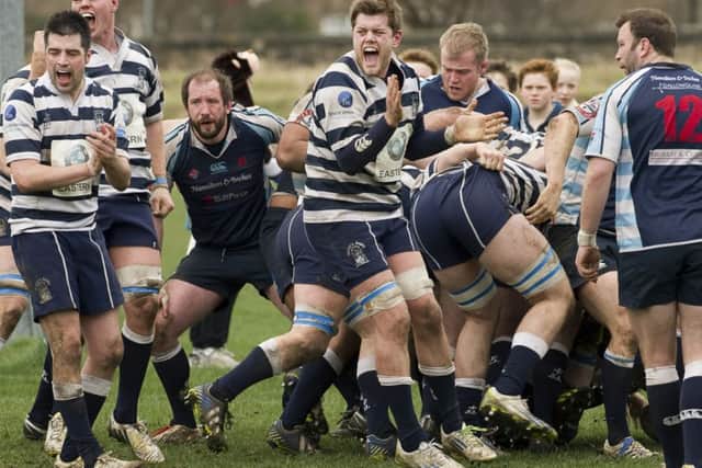 The Heriots pack celebrates turning over an Academicals scrum. Picture: Steven Scott Taylor