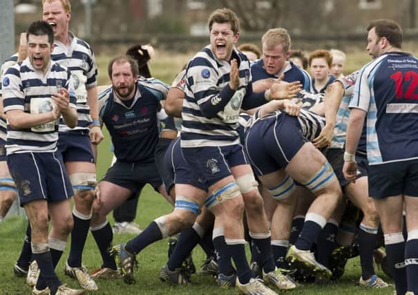 The Heriots pack celebrates turning over an Academicals scrum. Picture: Steven Scott Taylor