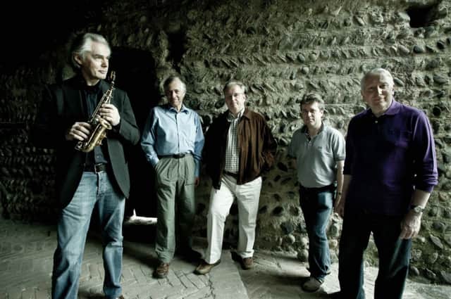 Jan Garbarek, left, with members of the soontoretire Hilliard Ensemble, produce a magical fusion