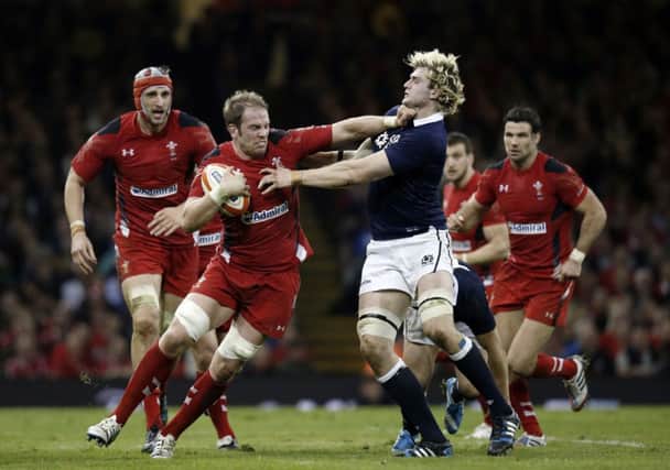 Wales lock Alun Wyn Jones fends off Scotlands Richie Gray. Picture: Getty Images
