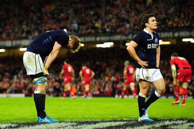 David Denton and Max Evans of Scotland  look on dejectedly after a Wales try. Picture: Getty