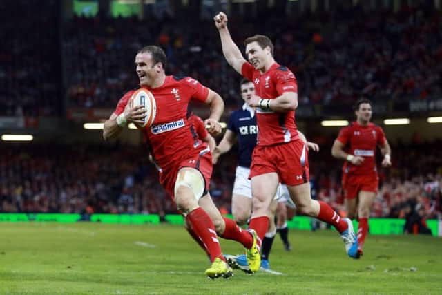 Jamie Roberts runs in a third try for Wales at the Millennium Stadium, Cardiff. Picture: PA