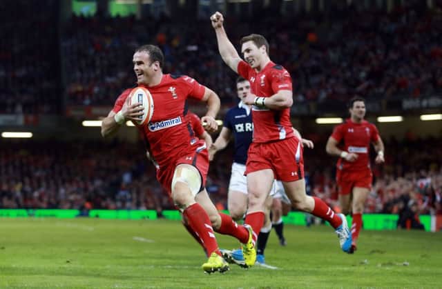 Jamie Roberts runs in a third try for Wales at the Millennium Stadium, Cardiff. Picture: PA