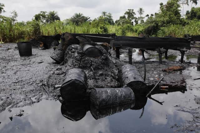 An abandoned illegal refinery after it was raided by Nigerias navy. Picture: AP
