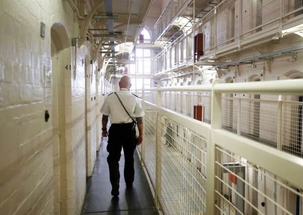 Social investment has provided a cost effective way of tackling prisoner reoffending. Picture: PA Wire