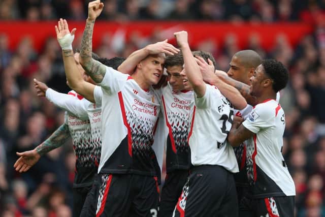 Liverpool ran riot consigning David Moyes United to a humiliating 3-0 home defeat. Picture: Getty