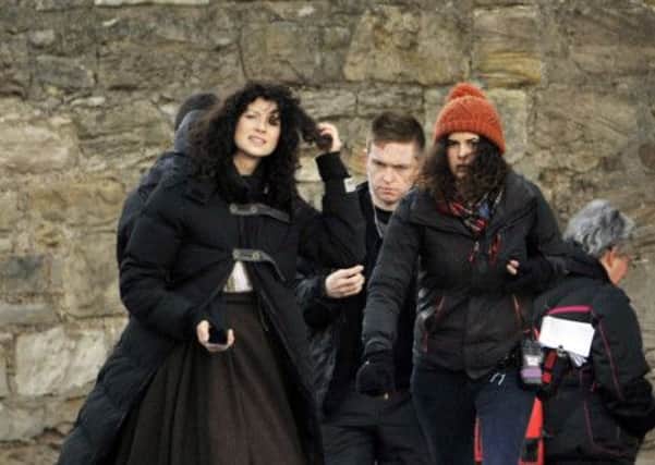 Outlander cast and crew during filming at Blackness Castle. Picture: Phil Wilkinson