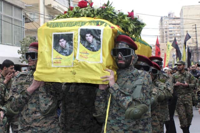Lebanons Hezbollah members carry the coffin of a comrade killed in the recent battles in Yabroud. Picture: Reuters