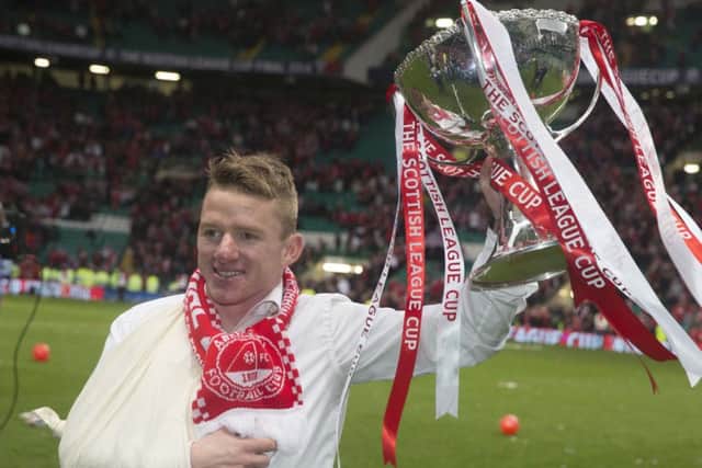 Aberdeens Jonny Hayes was all smiles despite suffering an early shoulder injury. Picture: PA