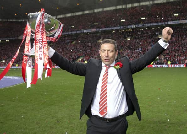 A victorious Derek McInnes picks up our Manager of the week award. Picture: PA
