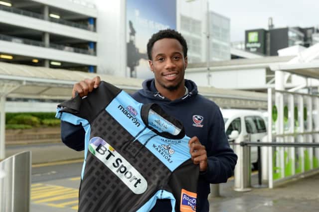 Carlin Isles arrives in Scotland. Picture: SNS